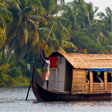 Drift through Kerala’s famed backwaters on a traditional houseboat