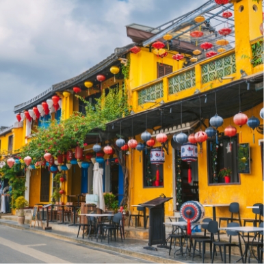 Guided walking tour of Hoi An Old Town, known for its yellow-walled houses and lantern-lit streets