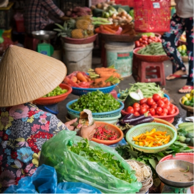 Evening Hoi An food tour by vintage Vespa sampling scrumptious and flavoursome specialities along the way
